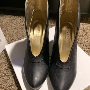Brand new black booties from Monroe and Main.